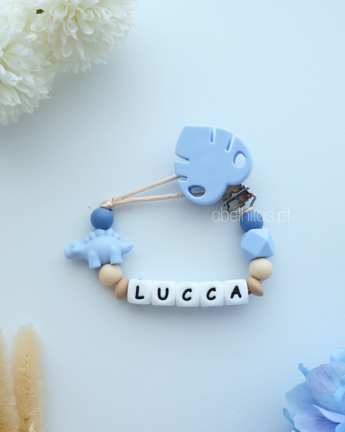 Prendedor de chupeta com nome - Dinossauro azul